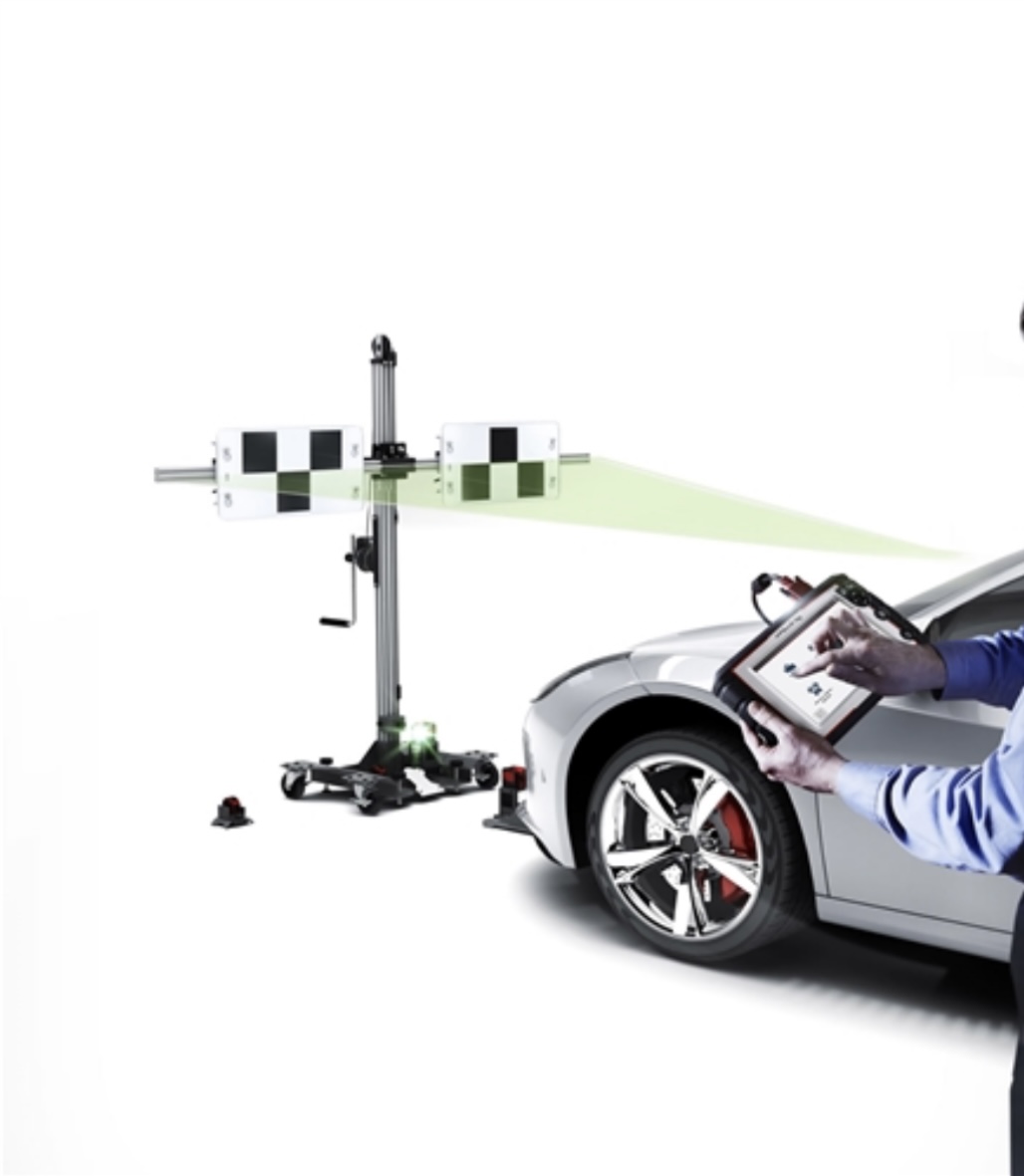 Proset Auto Glass technician performing on-site ADAS recalibration at customer home in Central Florida