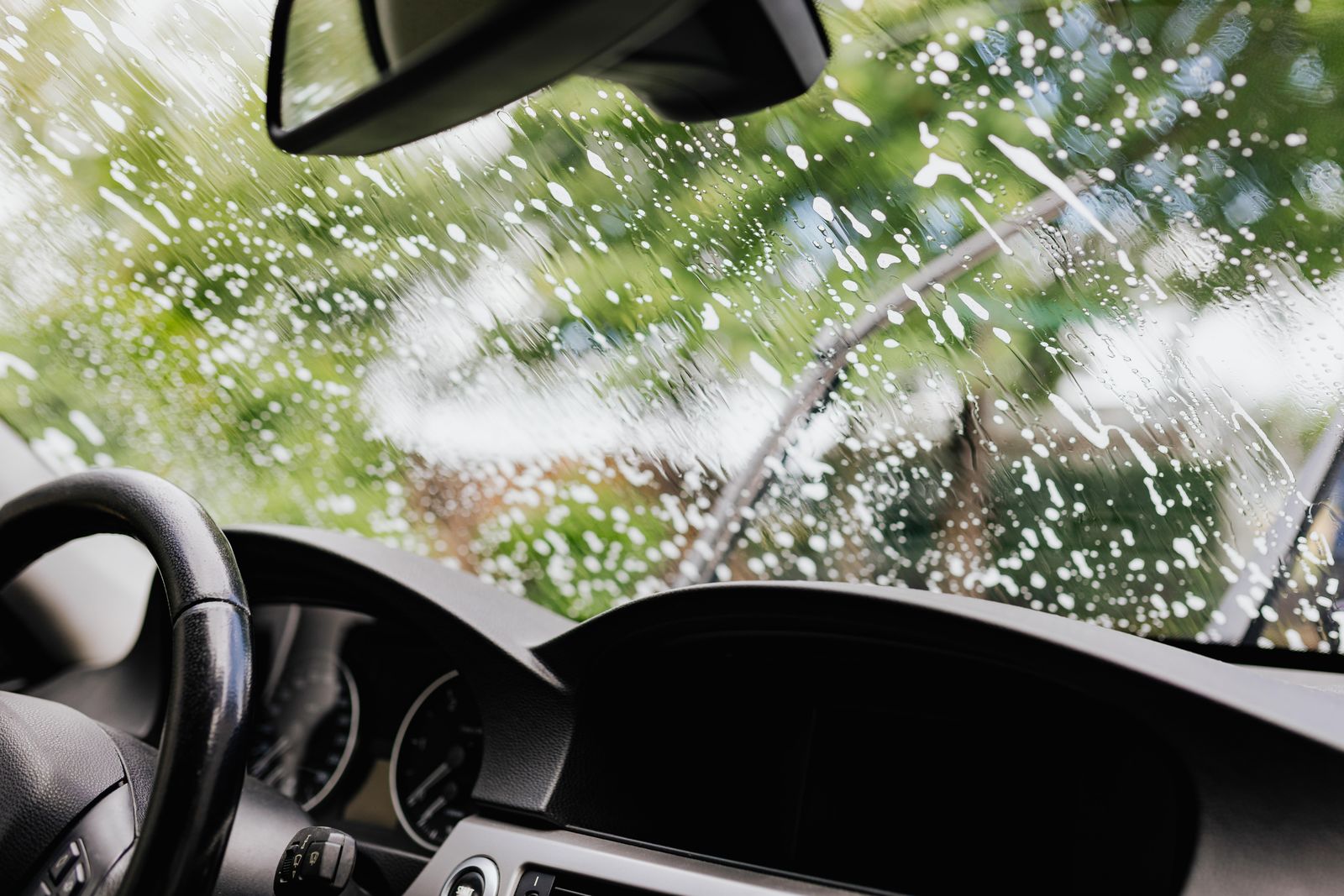 Clear view through a clean car windshield on a bright day