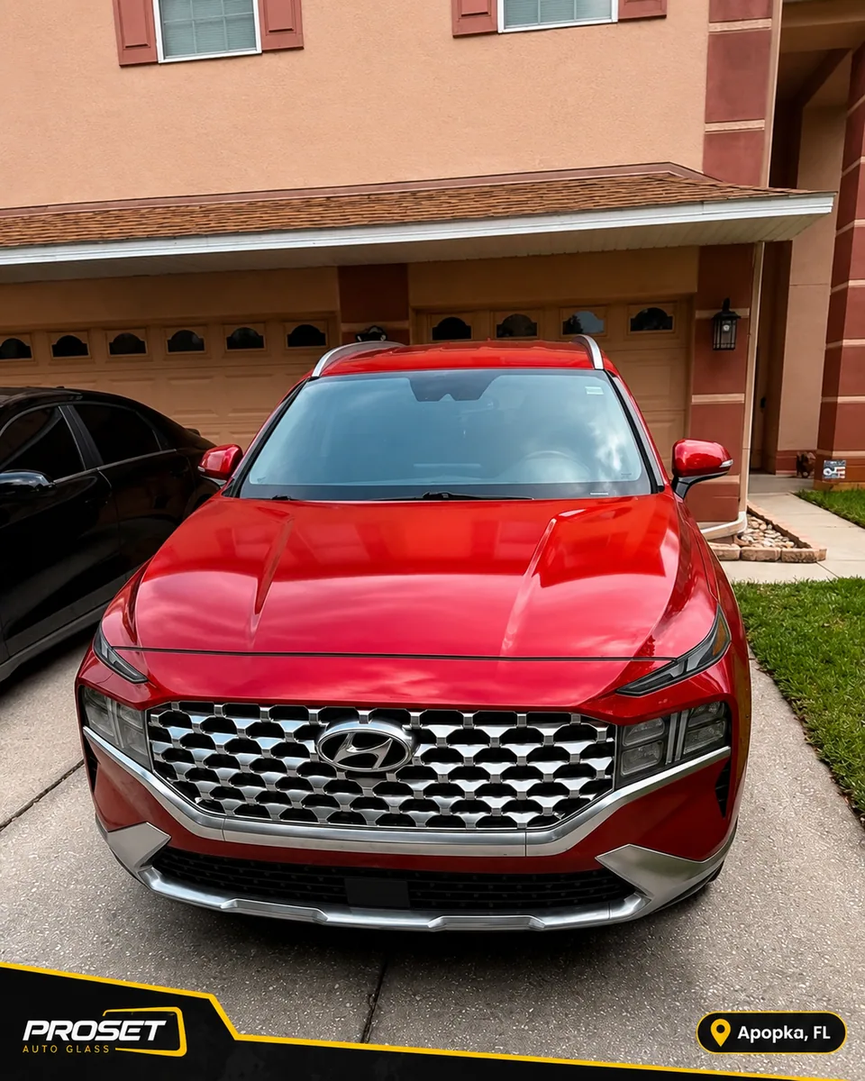 After windshield replacement on a red Hyundai SUV in Apopka FL by Proset Auto Glass